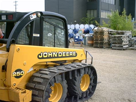 One of the tracks on my Deere skid steer has come out of the 